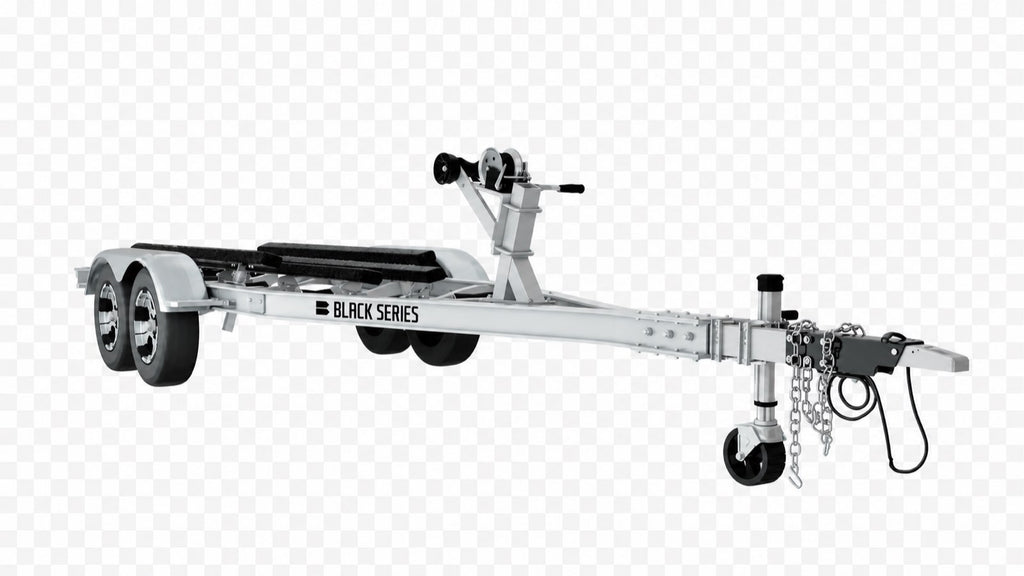 Aluminum boat trailer from the front quarter showing coupler, safety chains and swing-up jack wheel
